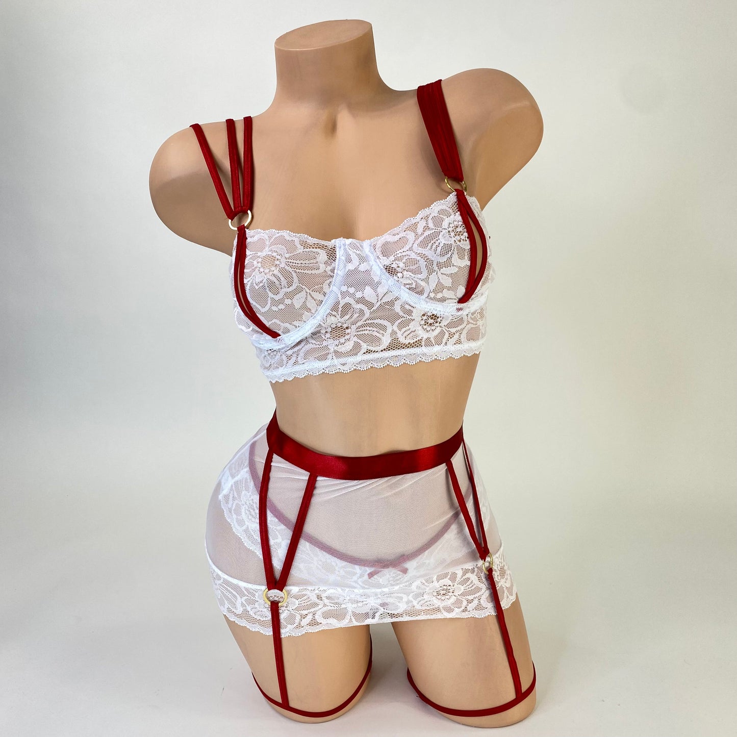White nurse headband costume accessory with red cross detail, close-up — Golddiggers Boutique exotic dancewear