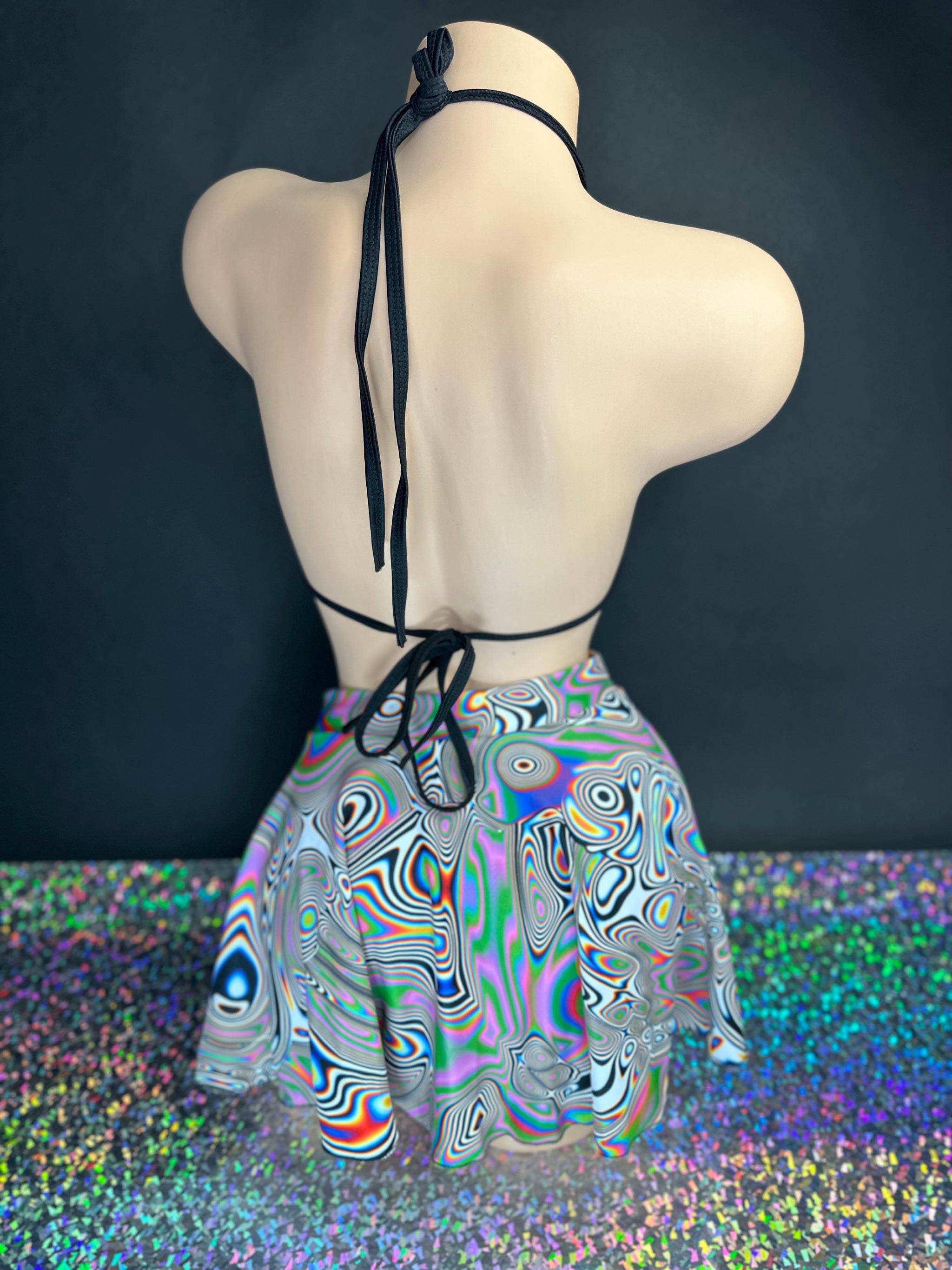 Kenya psychedelic skater skirt swirl print pattern, close-up — Golddiggers Boutique exotic dancewear