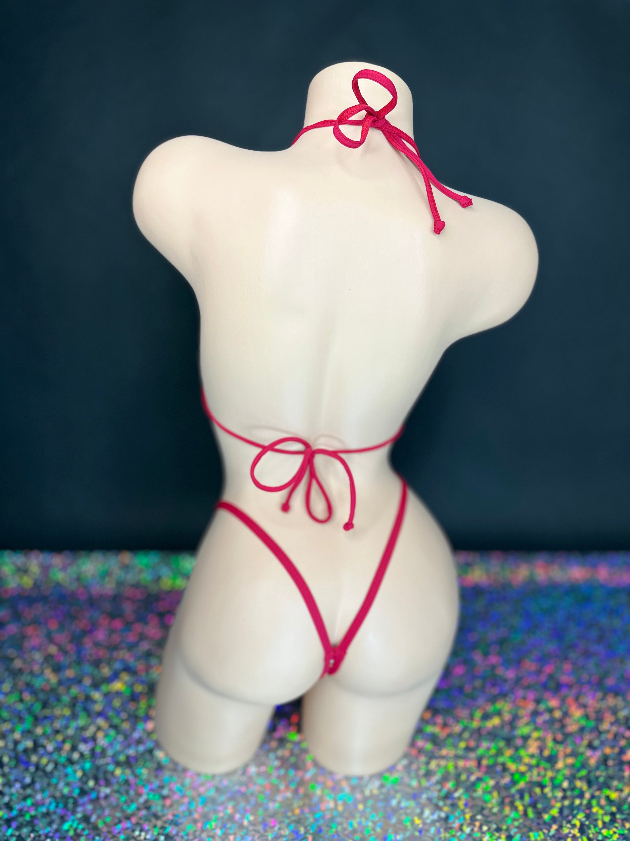 Red Katie 'kini, back view of ties and g-string on dark background - Golddiggers Boutique