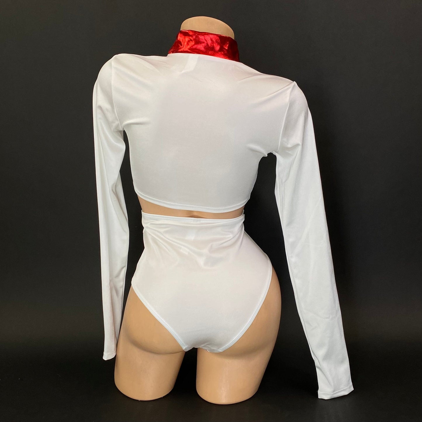 Toni white nurse costume zip-front crop top detail, flat lay — Golddiggers Boutique exotic dancewear