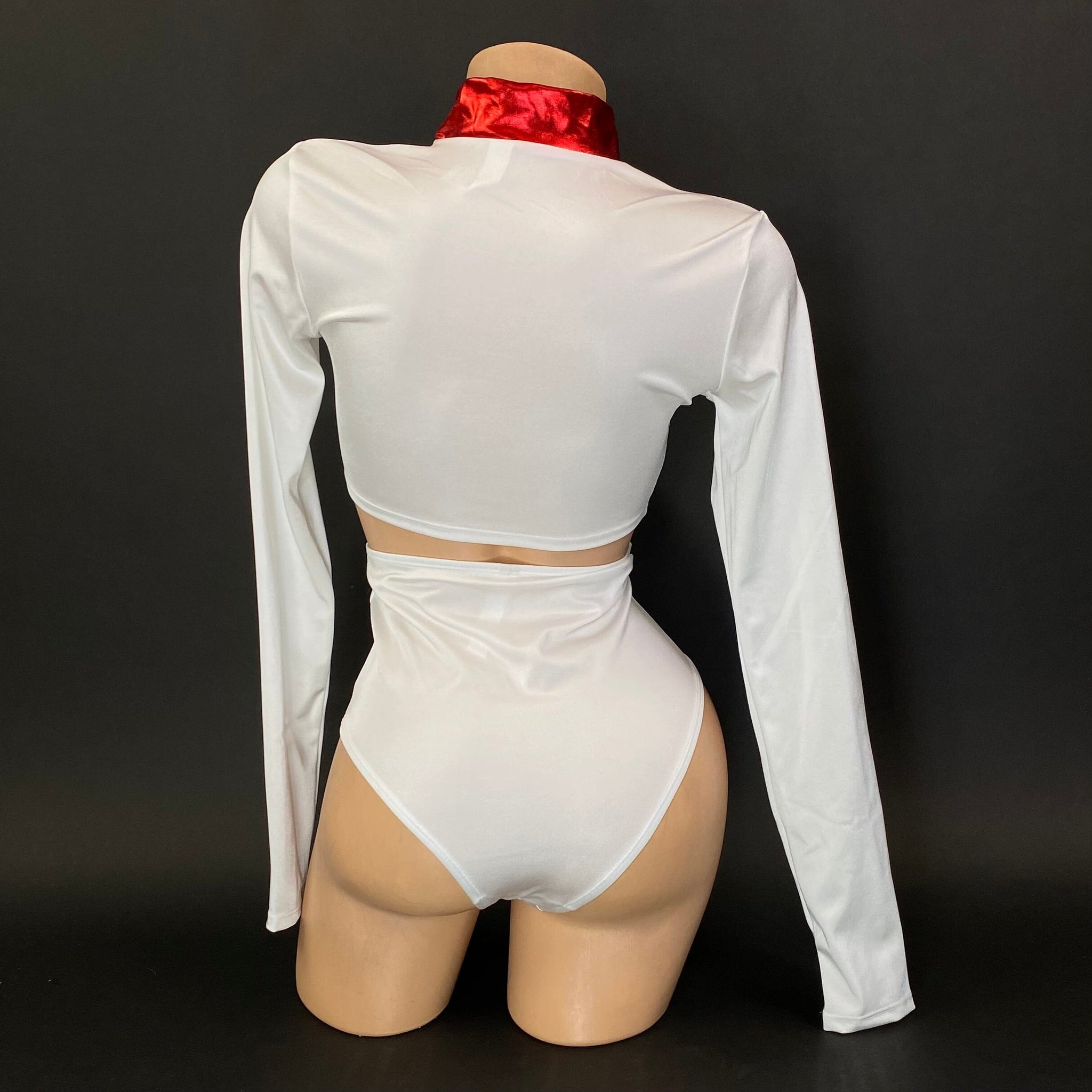 Toni white nurse costume zip-front crop top detail, flat lay — Golddiggers Boutique exotic dancewear