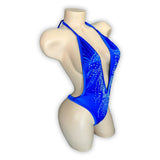 McKenna royal blue rhinestone bodysuit v-neckline detail, side view — Golddiggers Boutique exotic dancewear