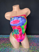 Tie-dye tube bodysuit coral swirl pattern, flat lay — Golddiggers Boutique exotic dancewear